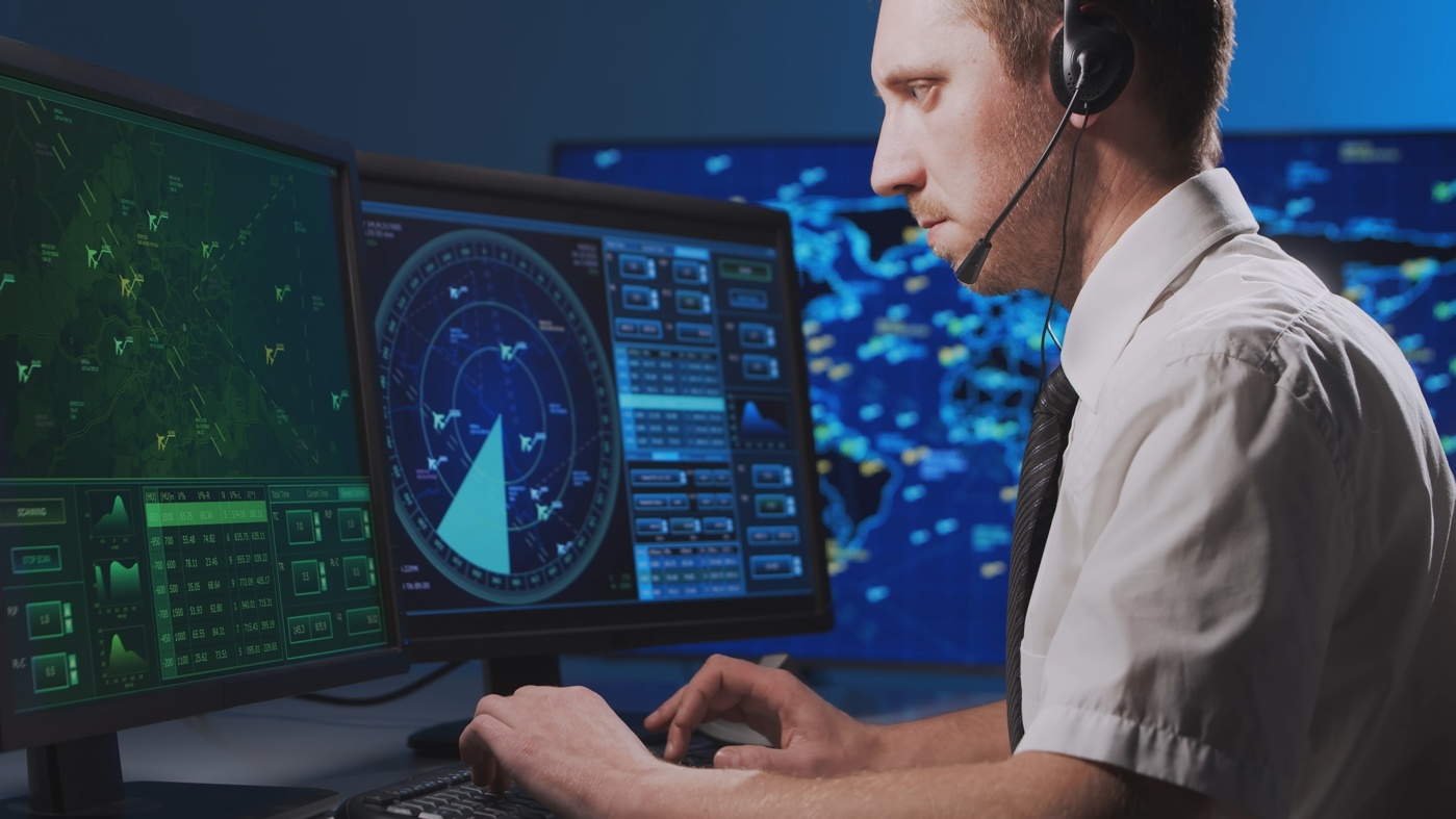 An air traffic controller HF controls the movements in the air.