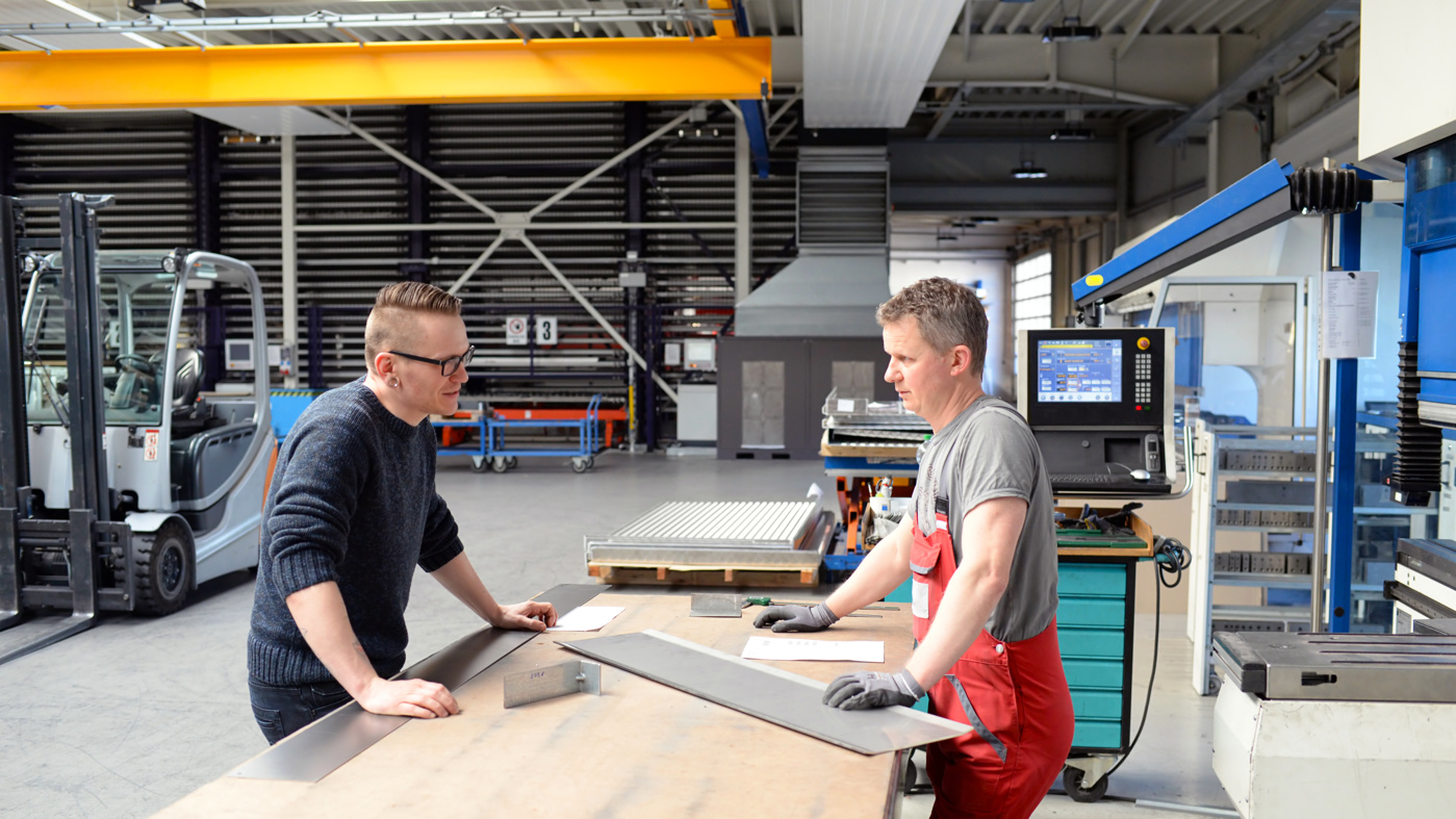 Metal construction manager, workshop manager and assembly manager at work in the company
